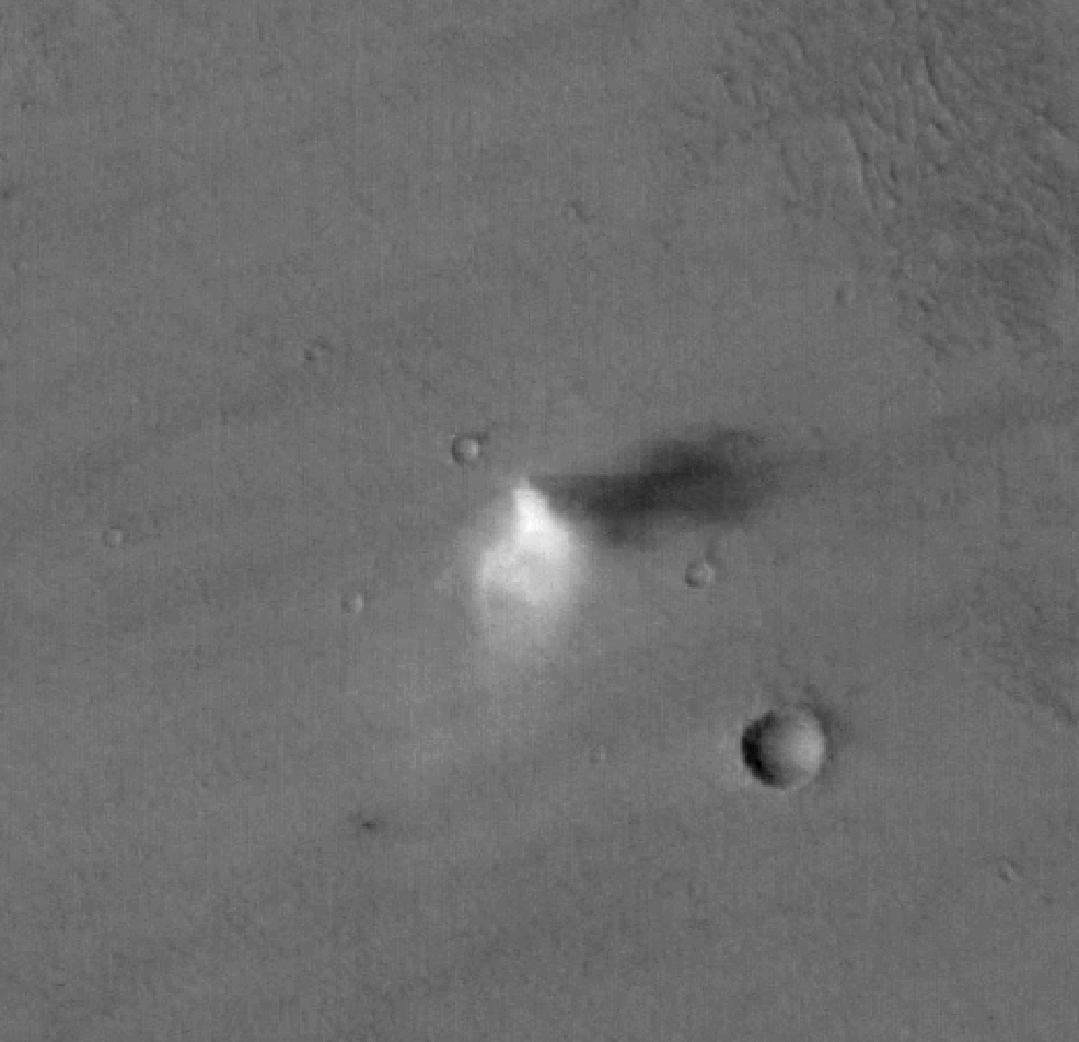Dust devil on Mars captured by ESA’s Mars Express HRSC camera, showing a bright vortex and shadow on the Martian surface.