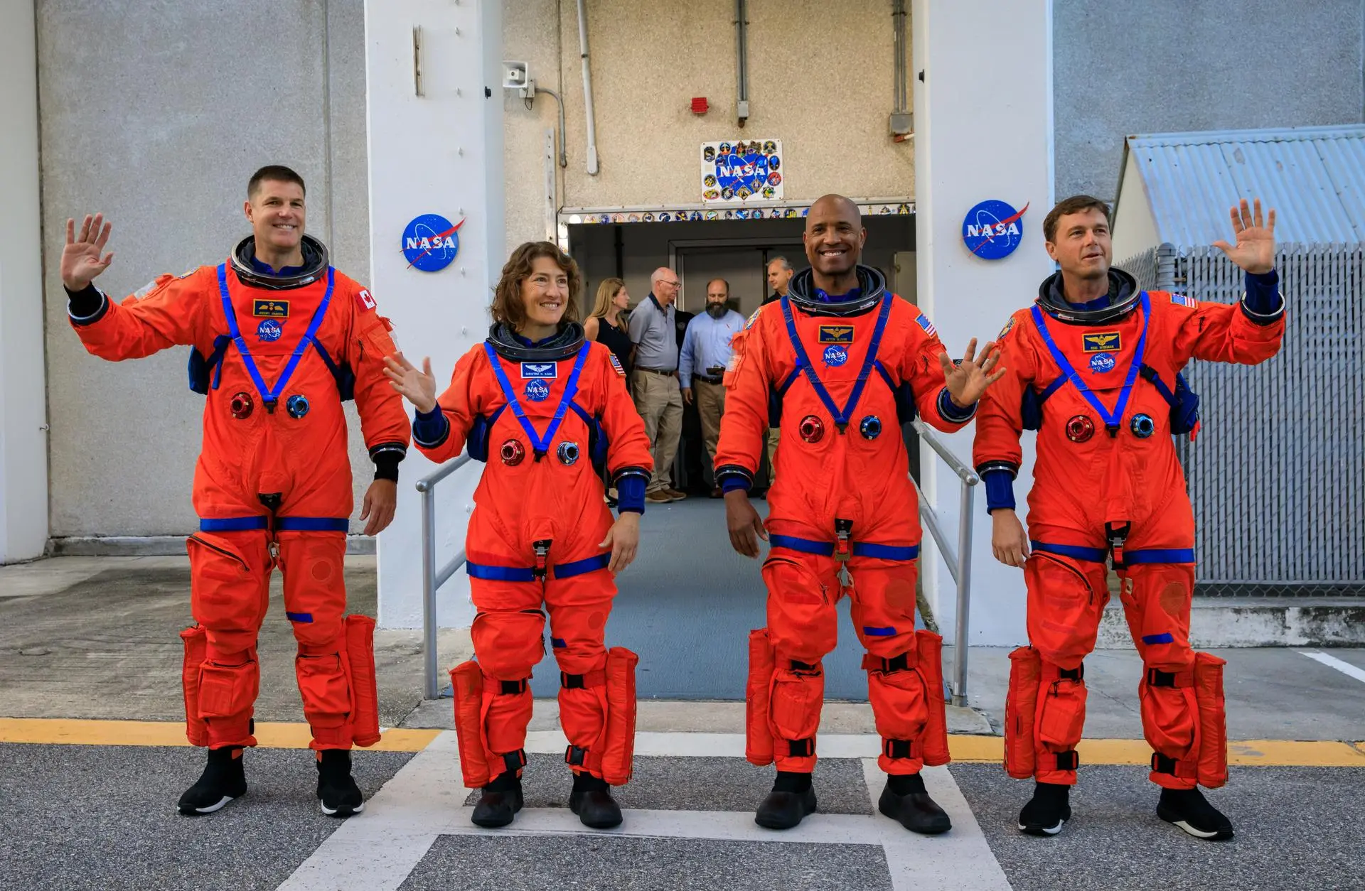 Artemis II astronauts in orange flight suits during pre-launch test at NASA’s Kennedy Space Center, September 20, 2023.