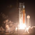 NASA’s Space Launch System (SLS) rocket lifting off during an Artemis mission launch from Kennedy Space Center.