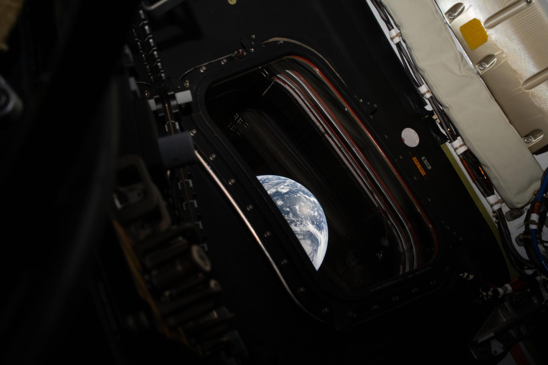 Earth seen through Orion spacecraft window Artemis II NASA